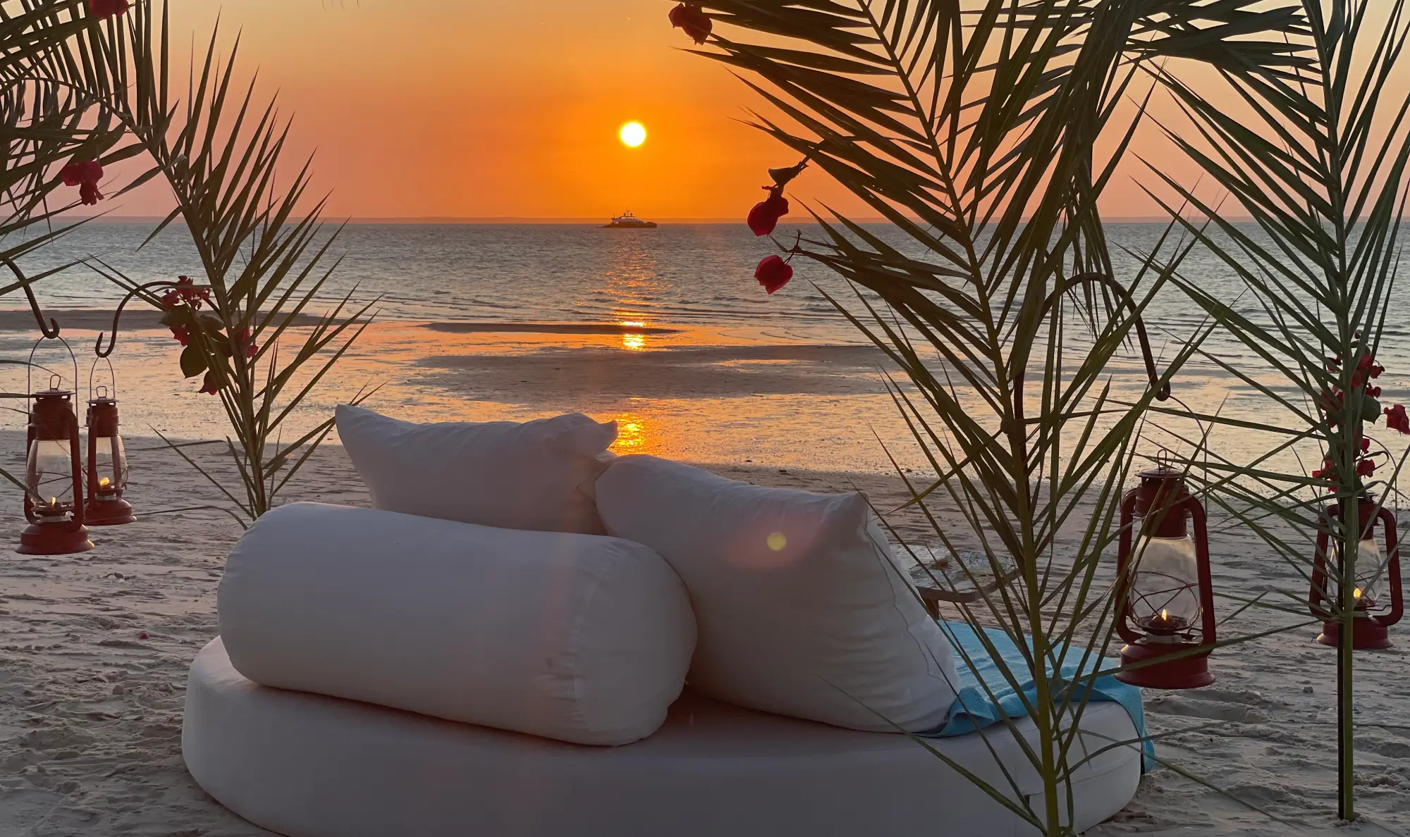 A romantic picnic at sunset on a beach in Africa