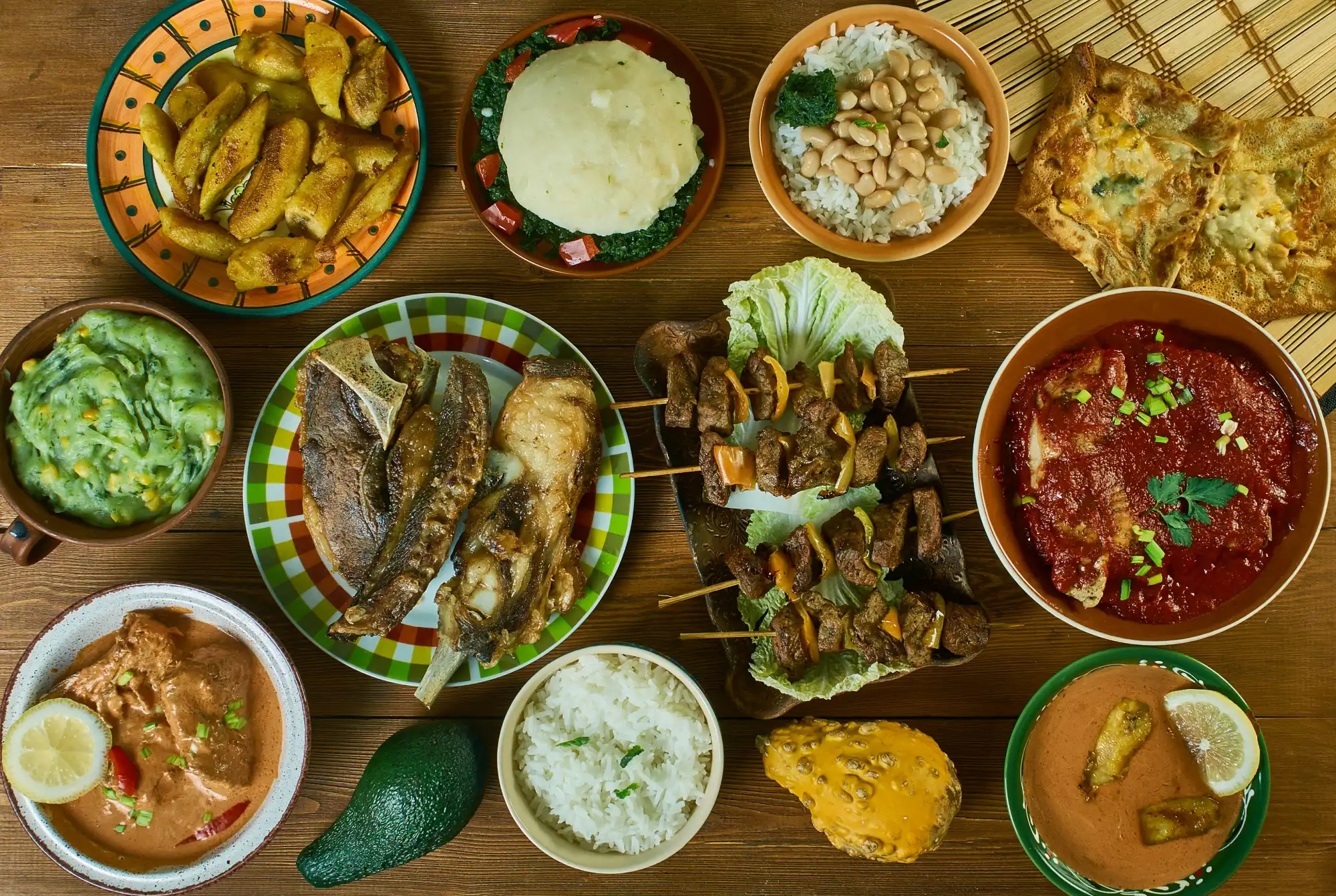 Tanzanian cuisine being served in dishes on a table.