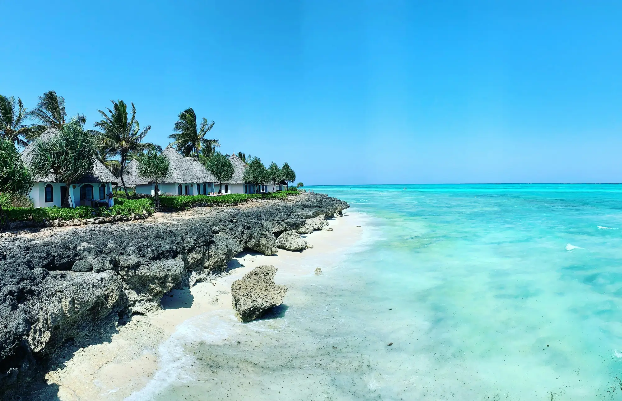 A beach resort right next to the beautiful blue shores of Zanzibar.